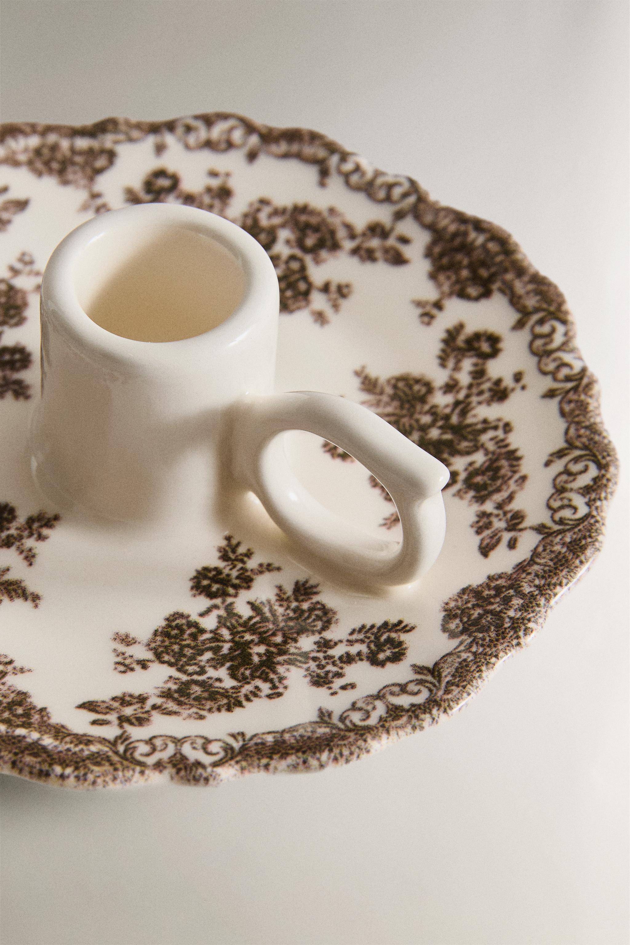 FLORAL EARTHENWARE CANDLEHOLDER